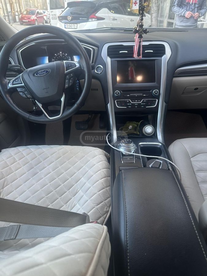 Ford Fusion - фото 10