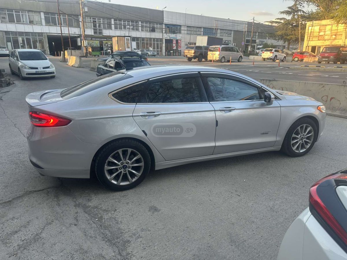 Ford Fusion - фото 8