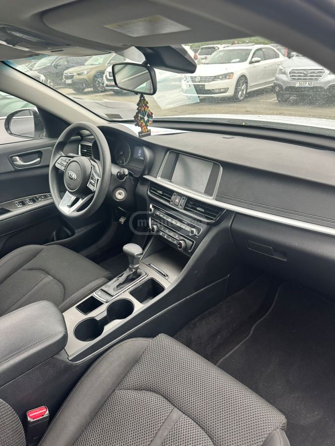 Kia Optima - фото 4