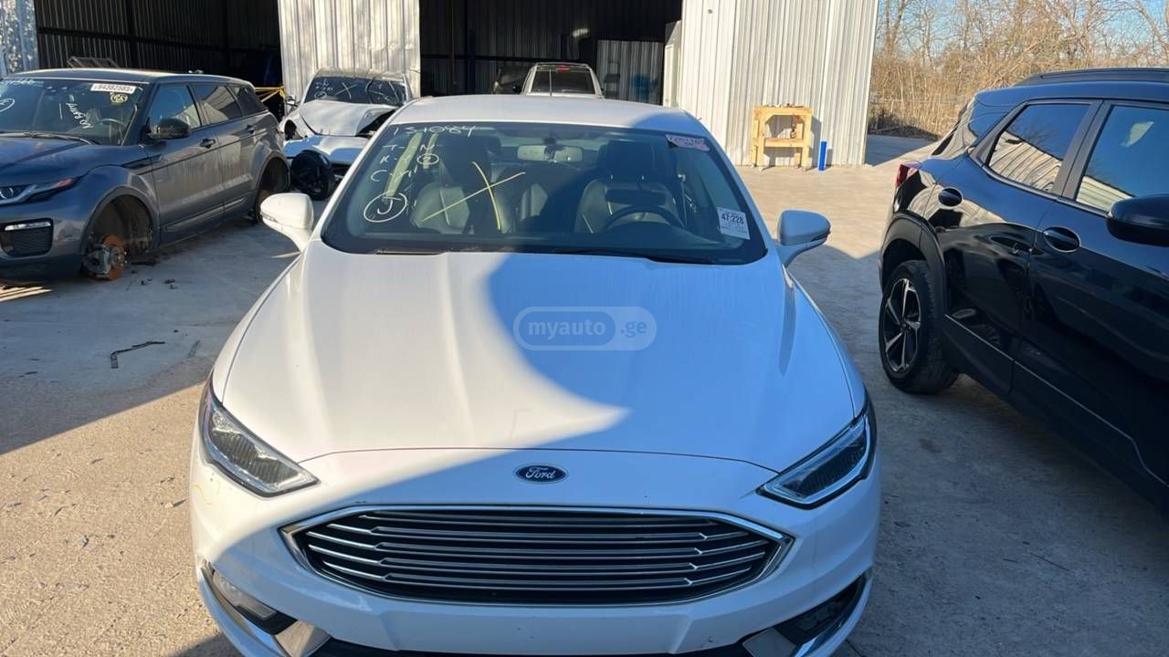 Ford Fusion - фото 9