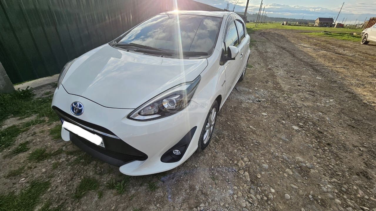 Toyota Aqua - фото 1