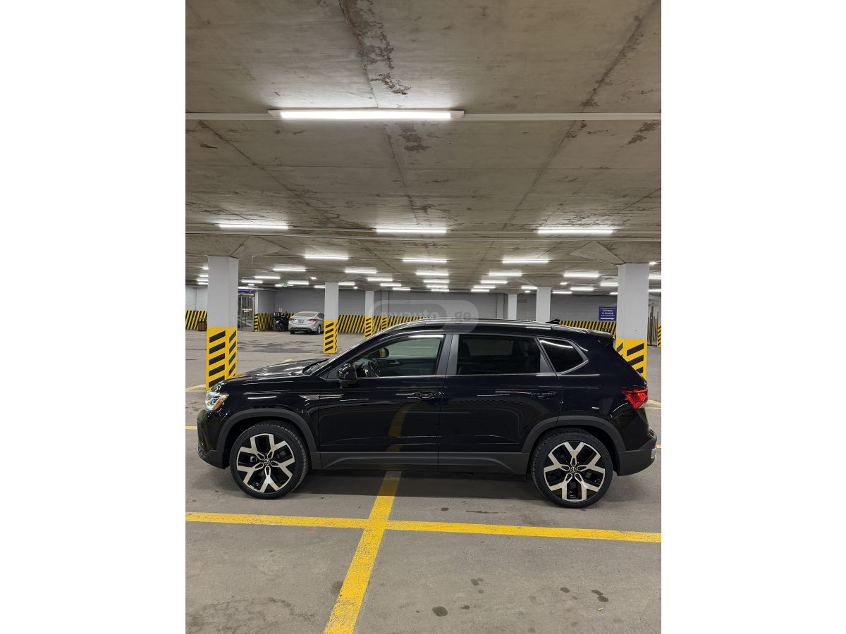 Volkswagen Taos - фото 2