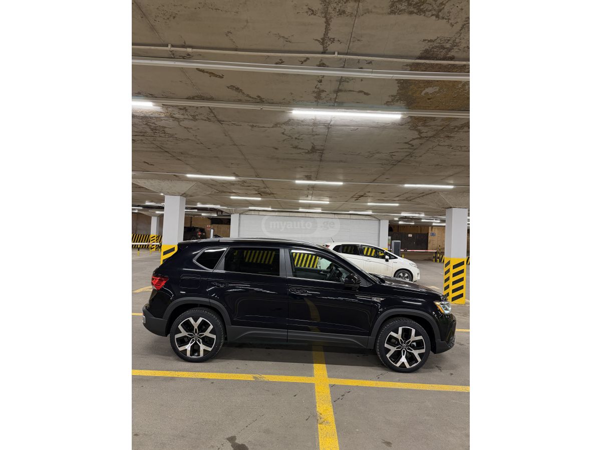 Volkswagen Taos - фото 6