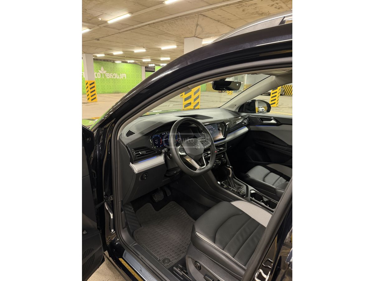 Volkswagen Taos - фото 8