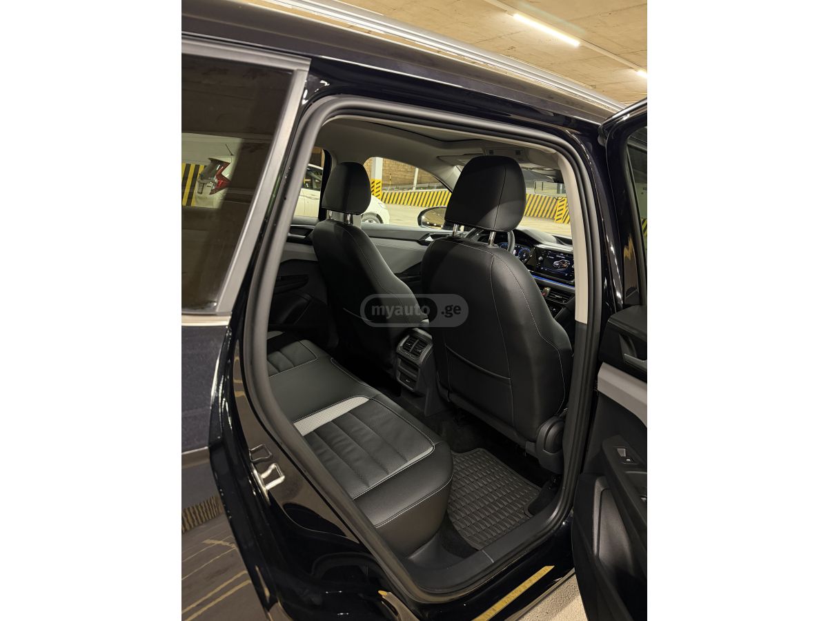 Volkswagen Taos - фото 9