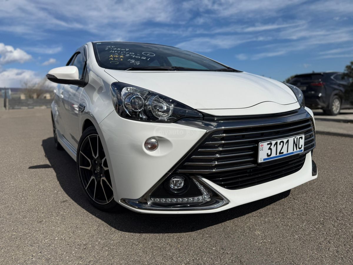 Toyota Aqua - фото 9