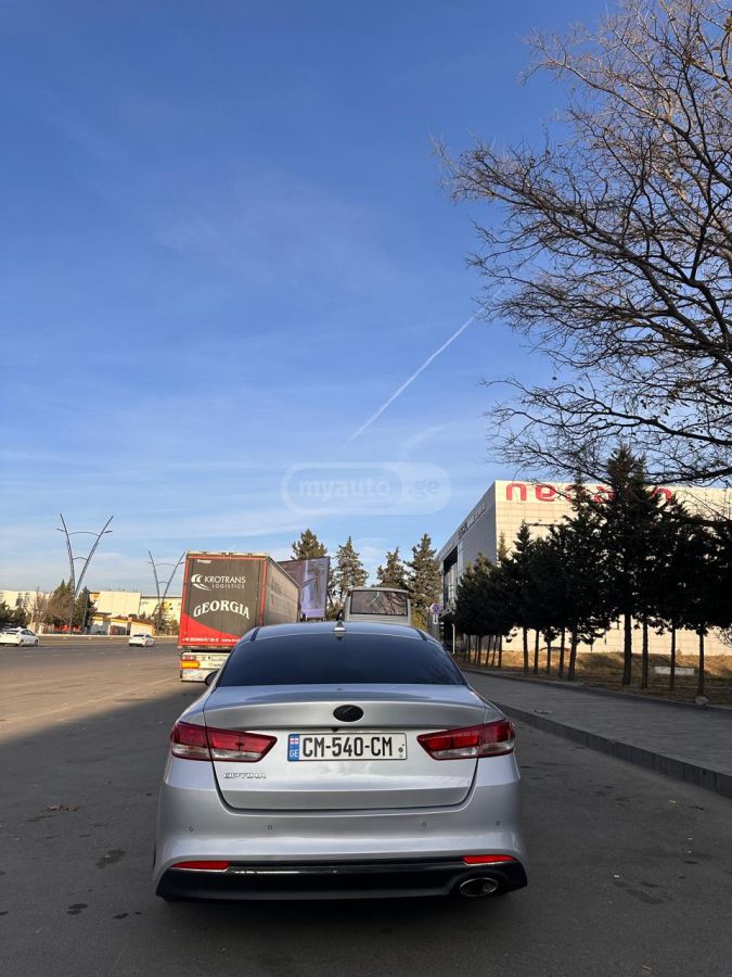 Kia Optima - фото 5