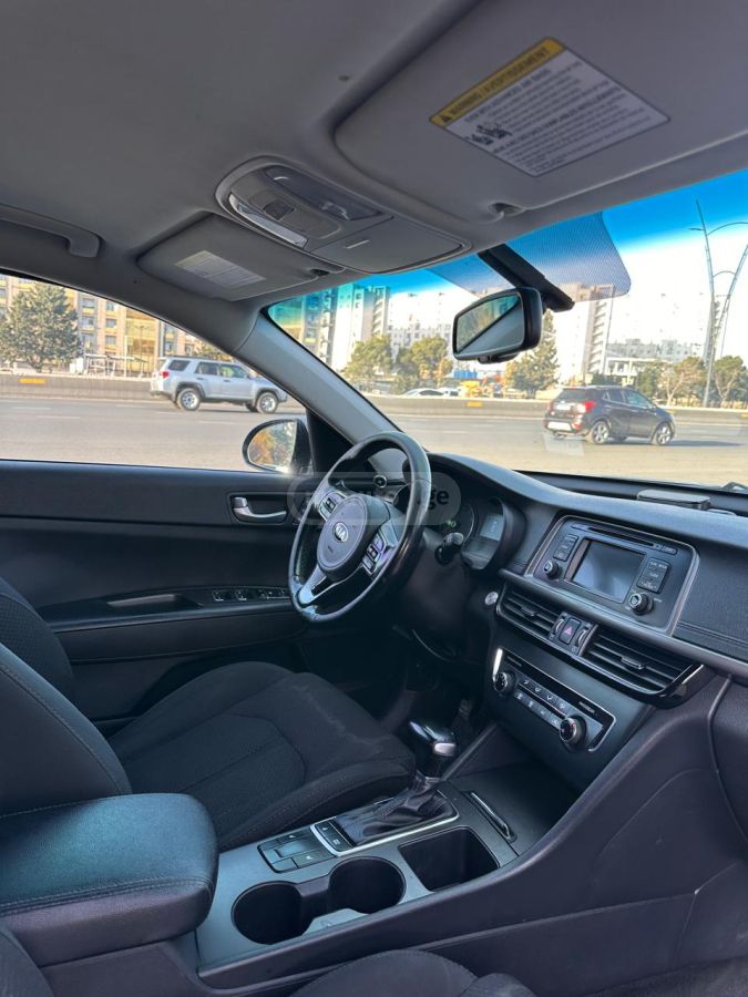 Kia Optima - фото 9