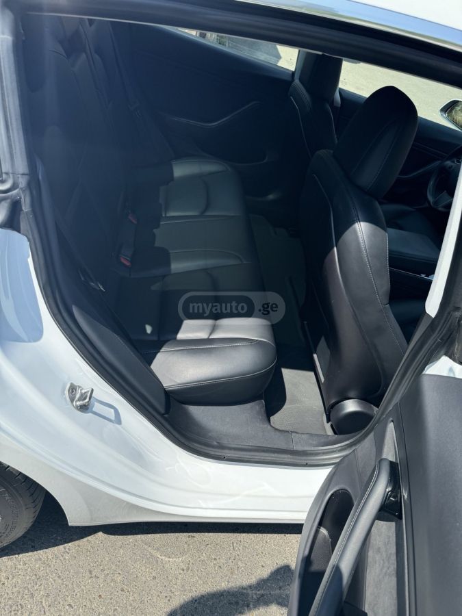 Tesla Model 3 - фото 7