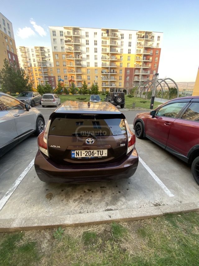 Toyota Aqua - фото 7