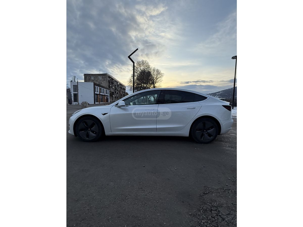 Tesla Model 3 - фото 6