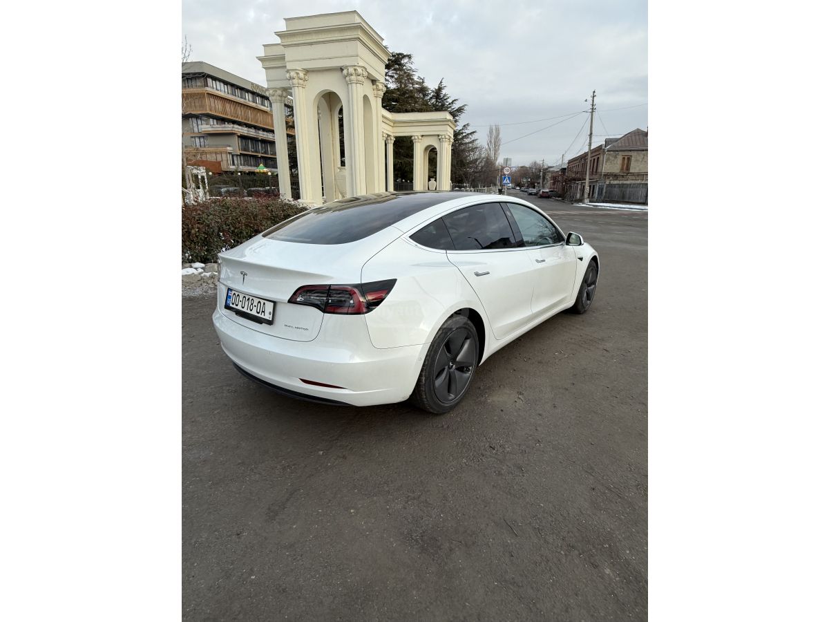 Tesla Model 3 - фото 7