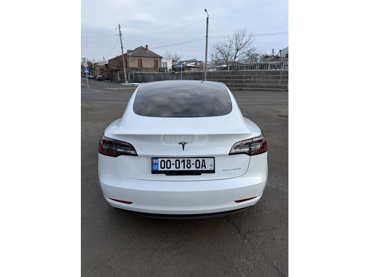 Tesla Model 3 - фото 9