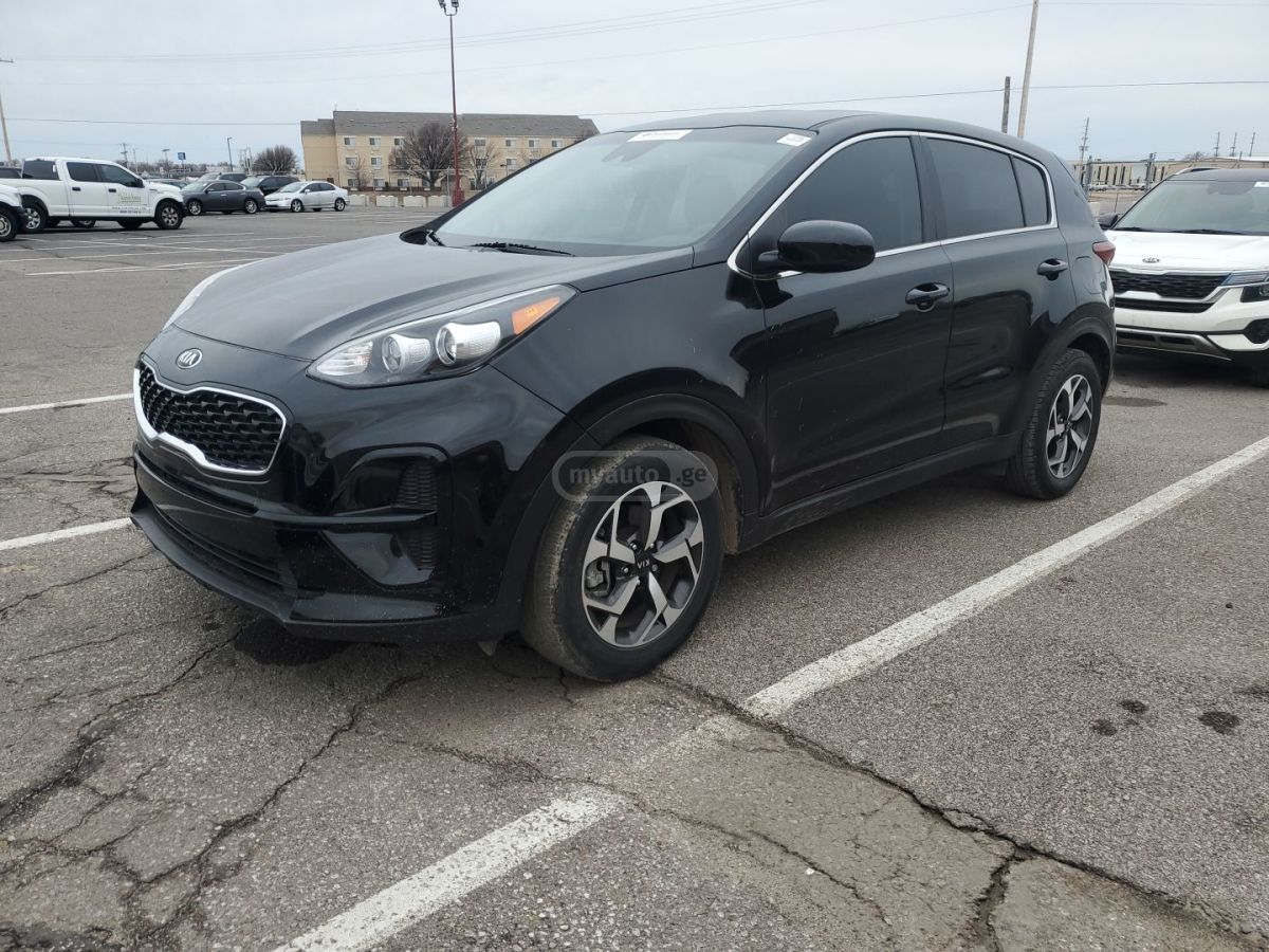 Kia Sportage - фото 1