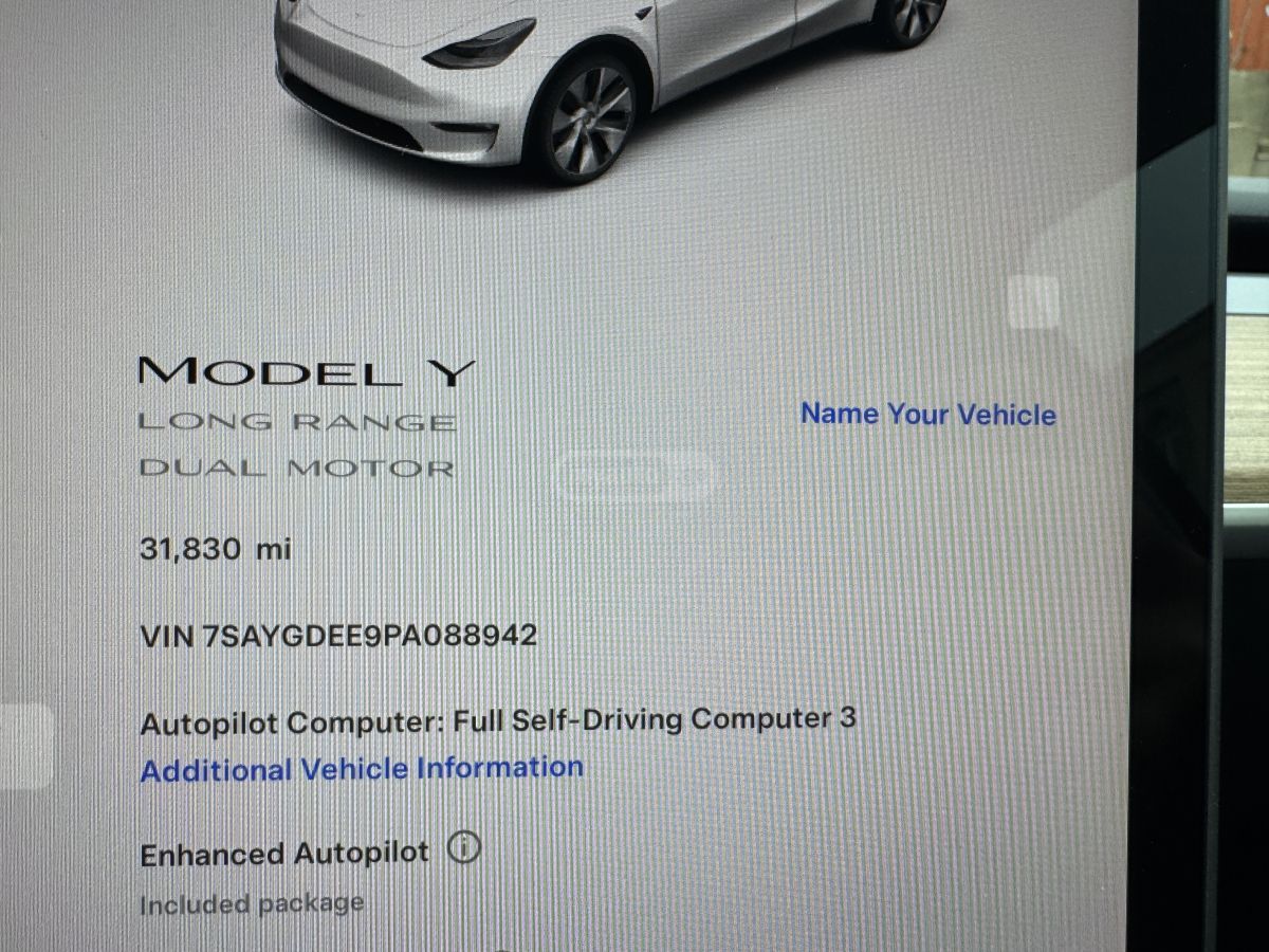 Tesla Model Y - фото 12