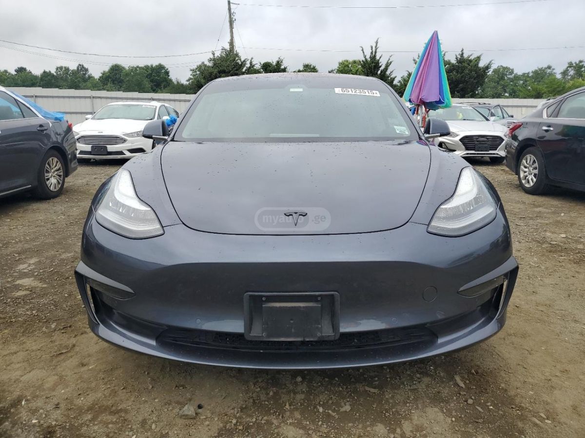 Tesla Model 3 - фото 5
