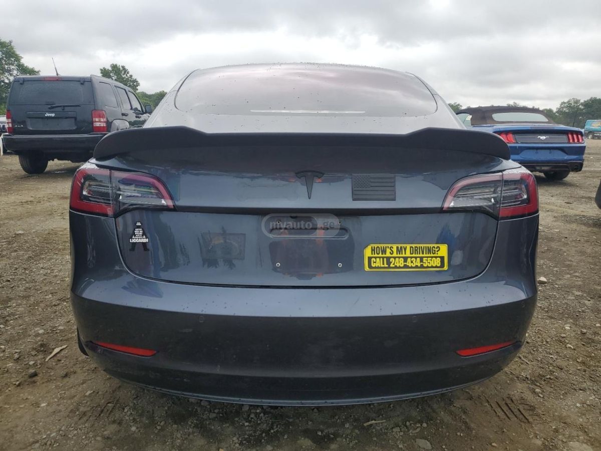 Tesla Model 3 - фото 6
