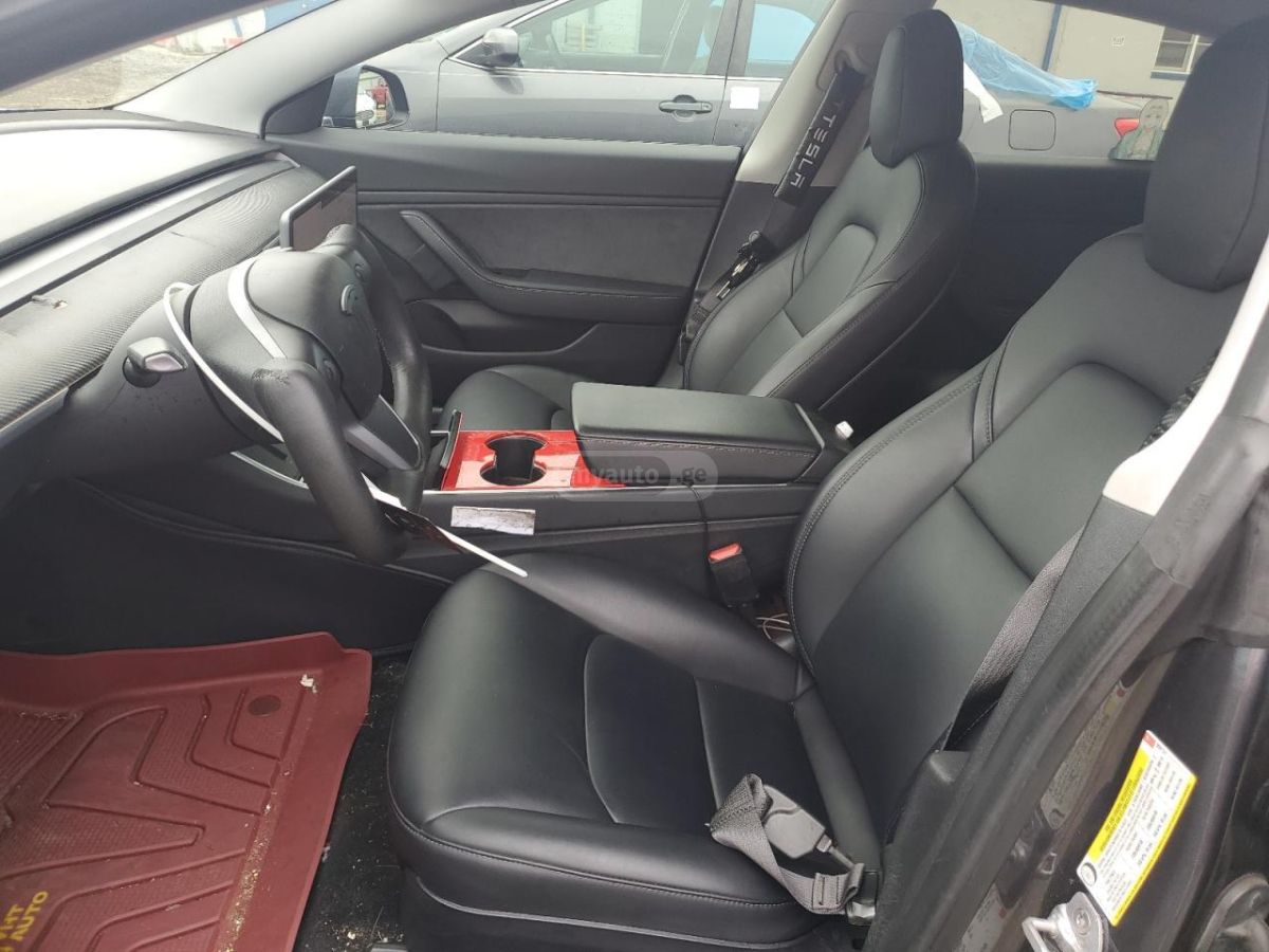 Tesla Model 3 - фото 7
