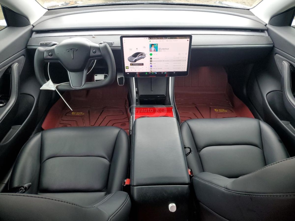 Tesla Model 3 - фото 8