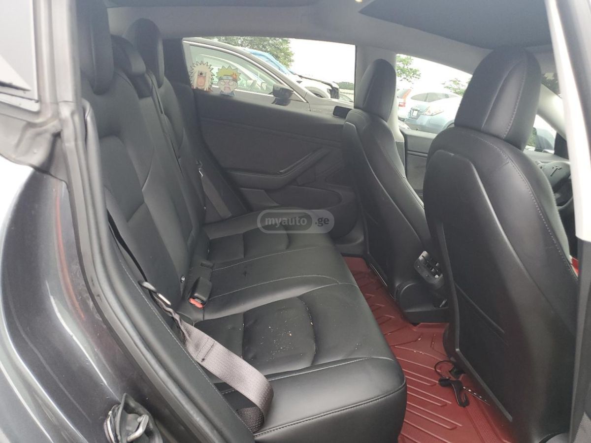 Tesla Model 3 - фото 9