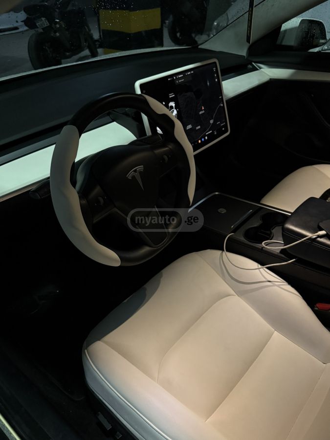 Tesla Model 3 - фото 5