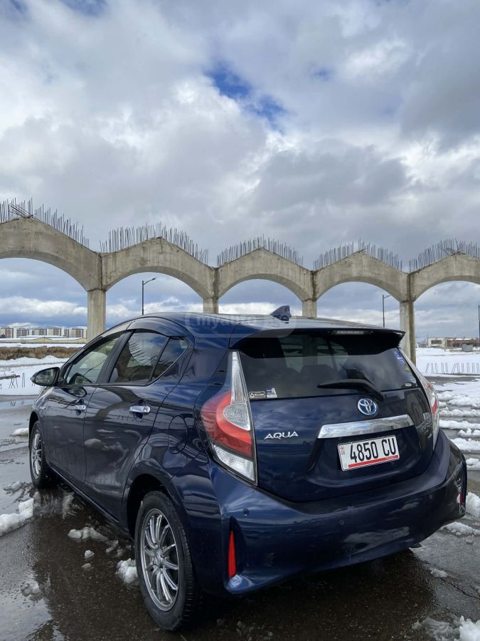 Toyota Aqua - фото 4