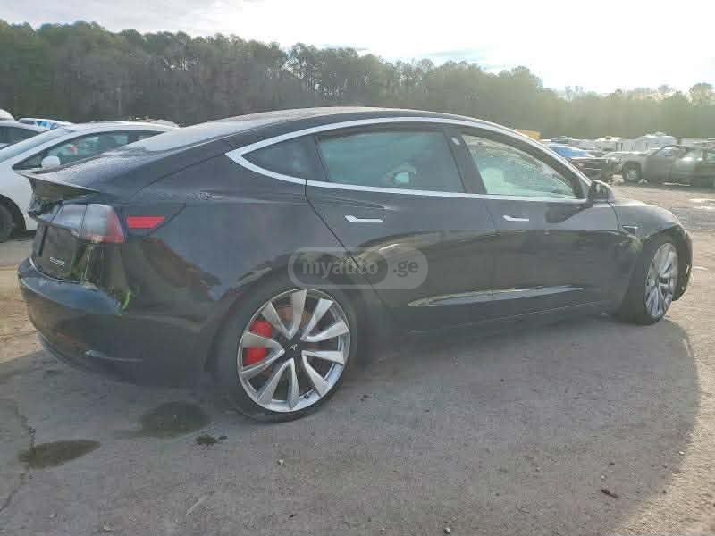 Tesla Model 3 - фото 11