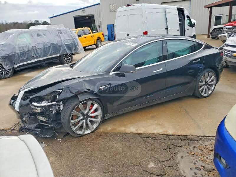 Tesla Model 3 - фото 13