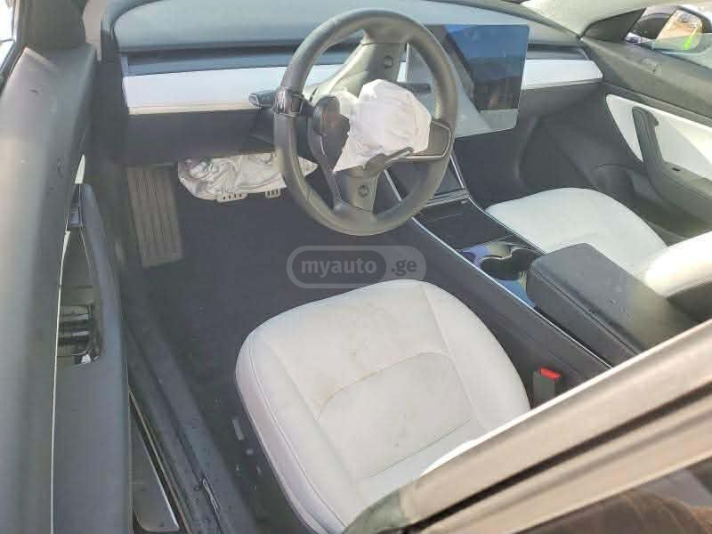 Tesla Model 3 - фото 5