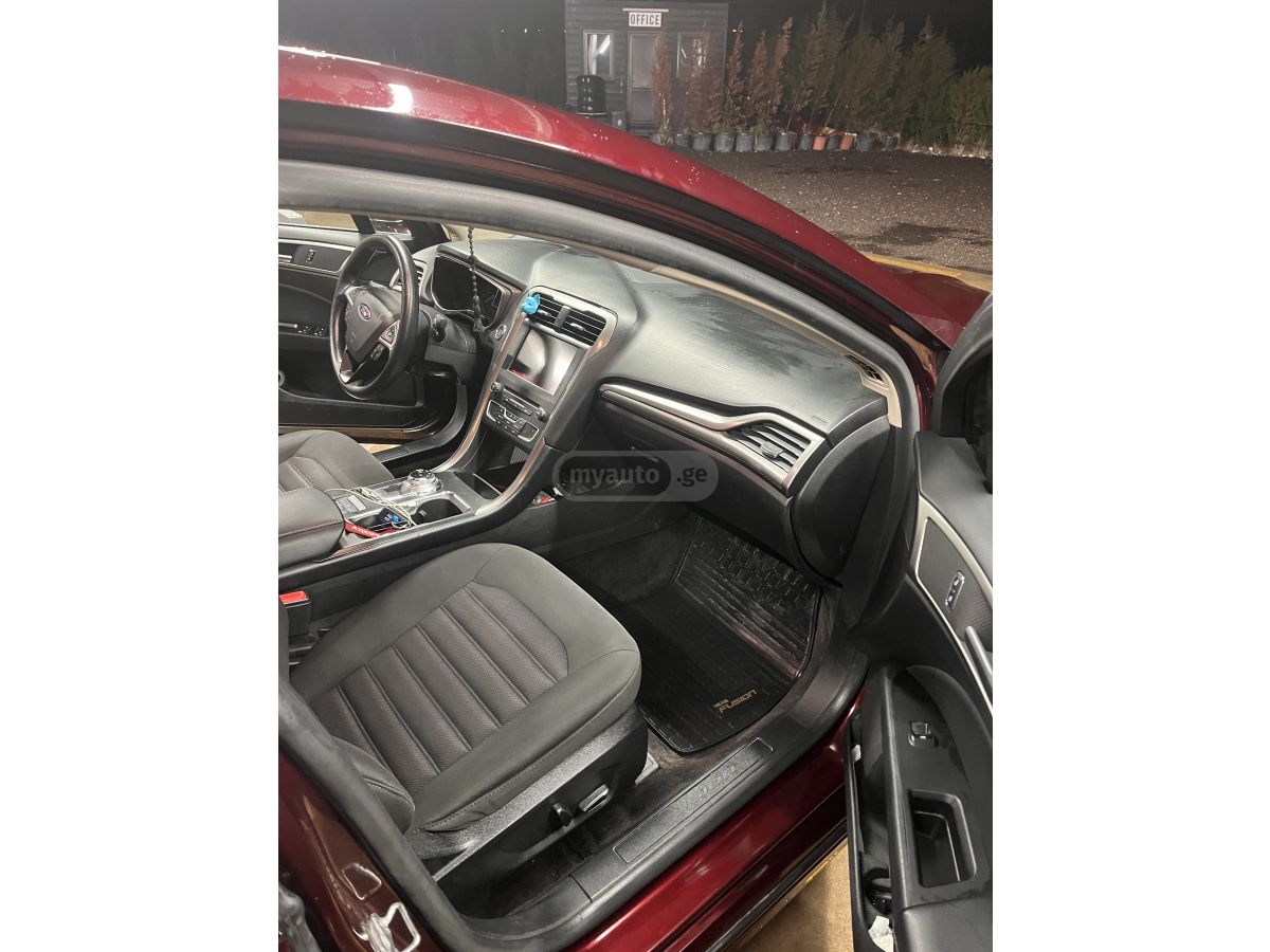 Ford Fusion - фото 12