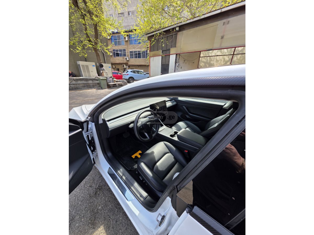 Tesla Model 3 - фото 5