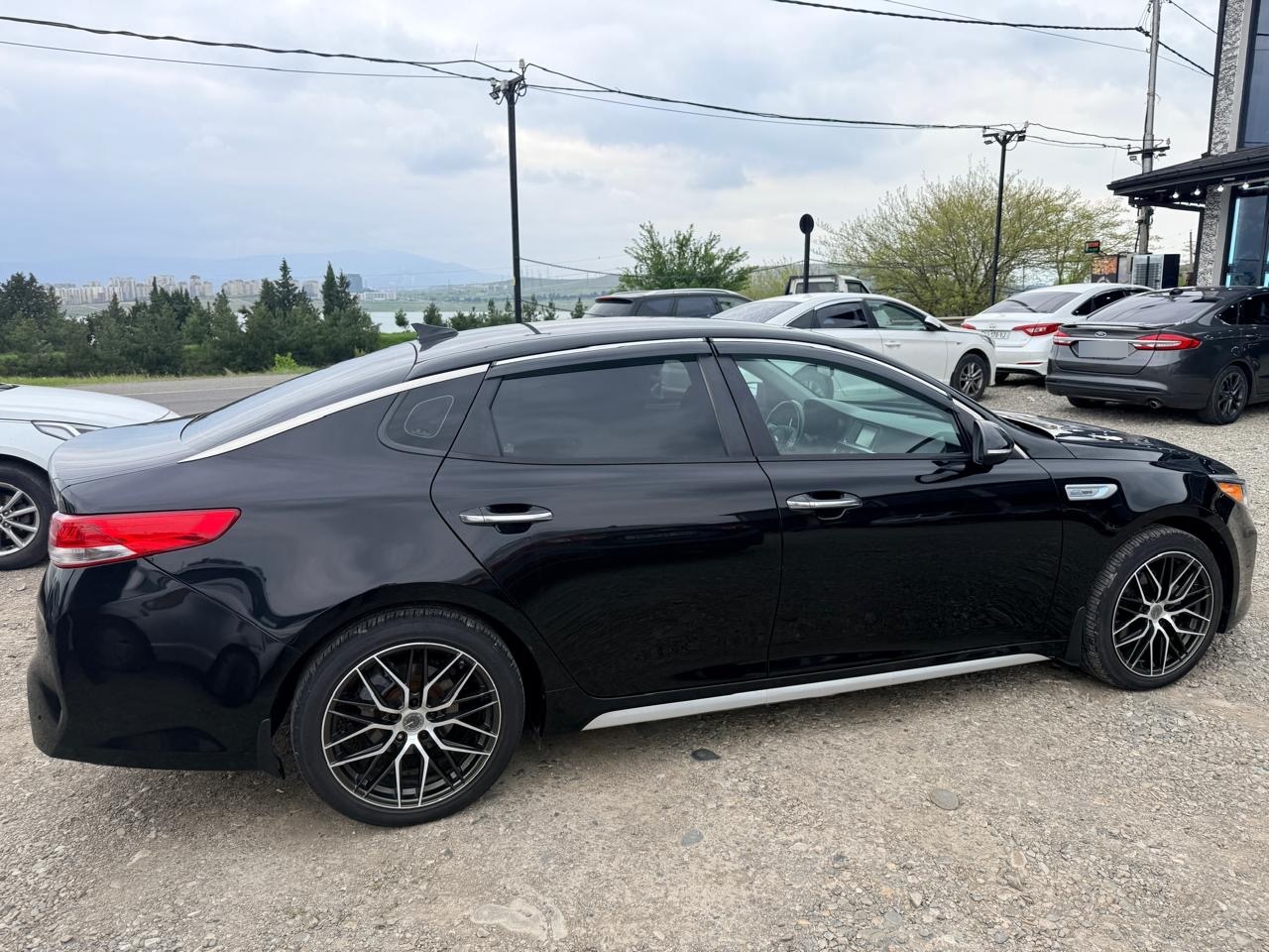 Kia Optima - фото 5