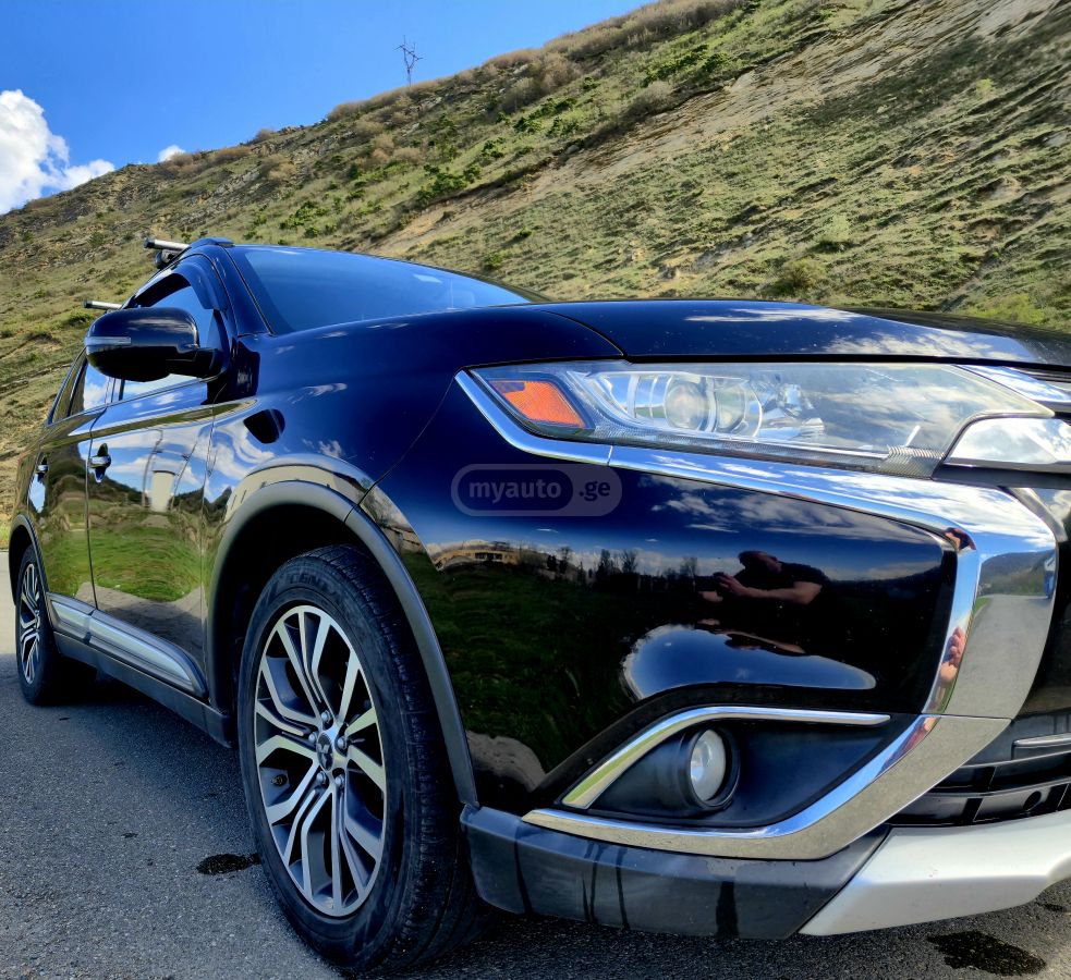 Mitsubishi Outlander - фото 12