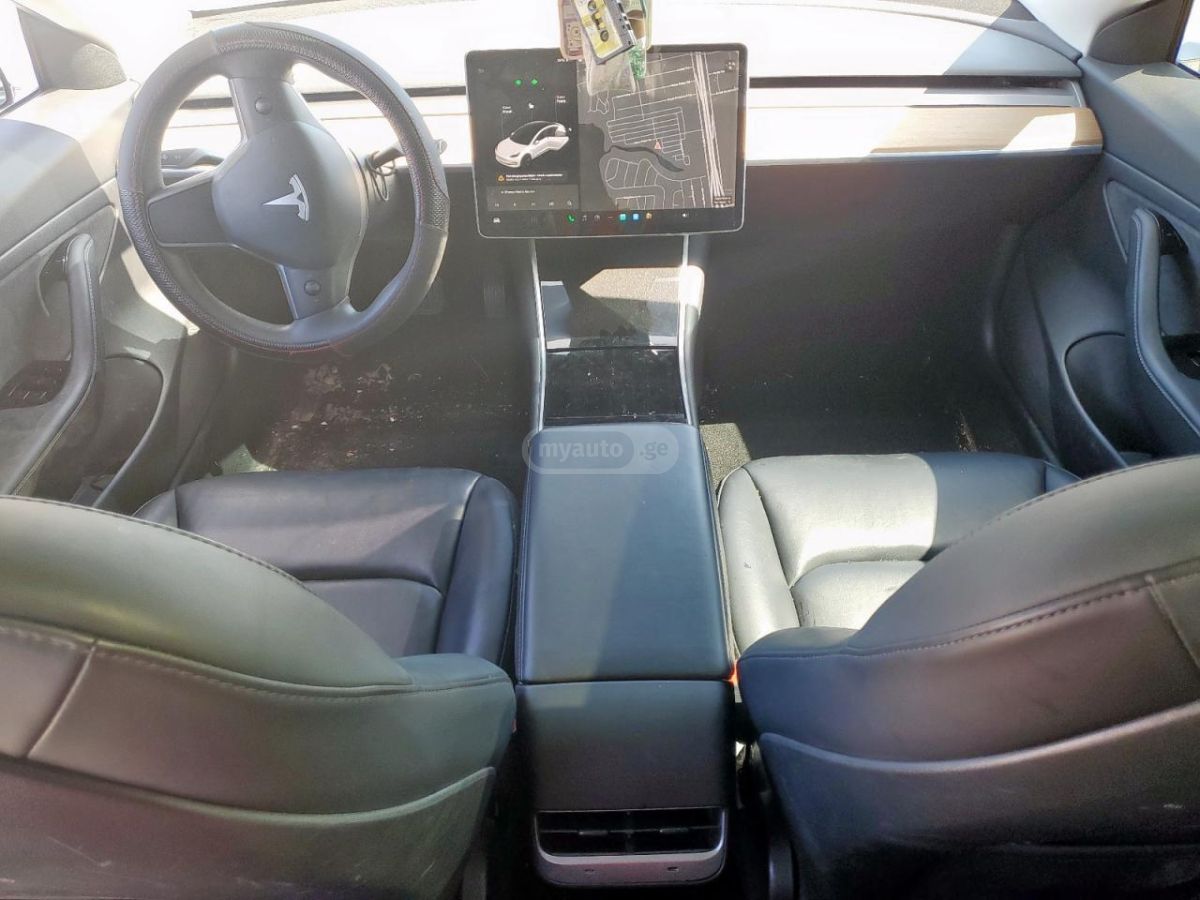 Tesla Model 3 - фото 8