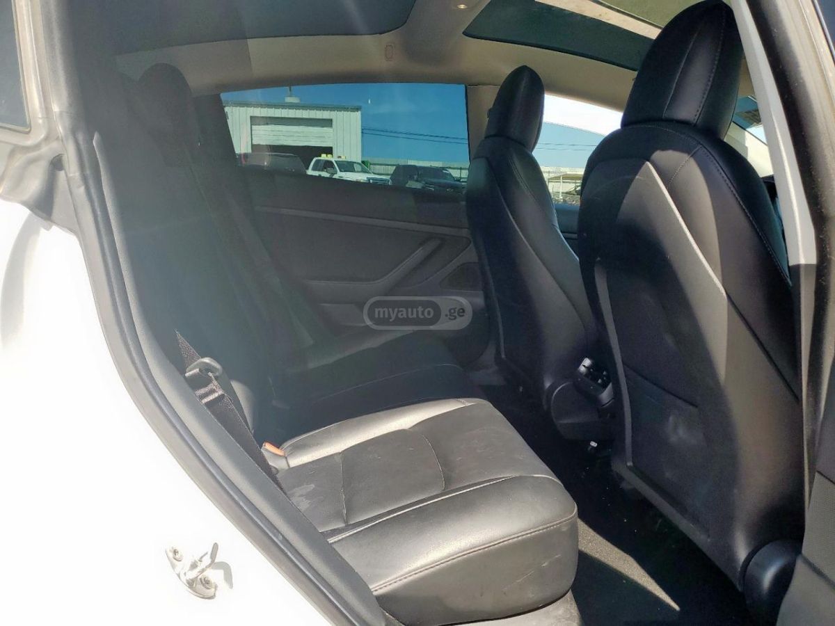 Tesla Model 3 - фото 9