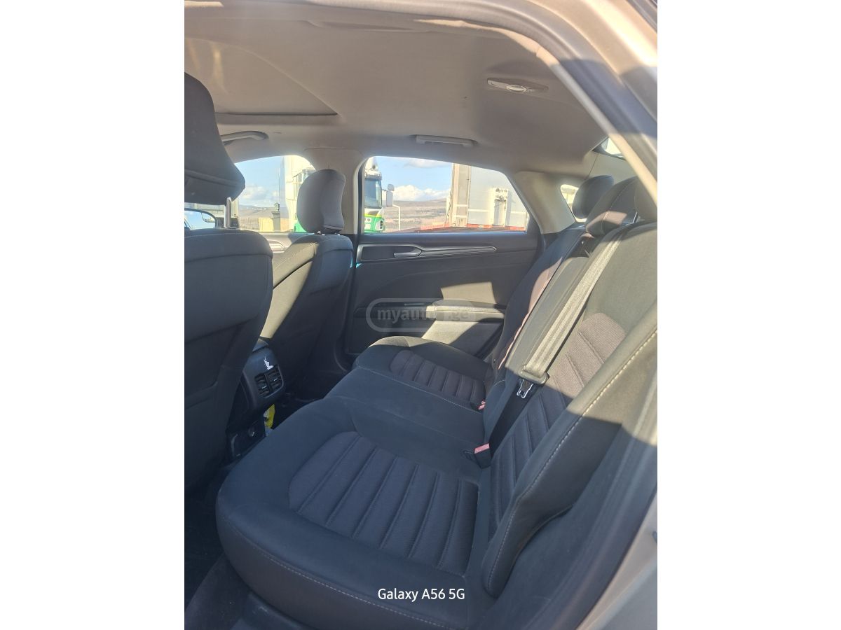 Ford Fusion - фото 9