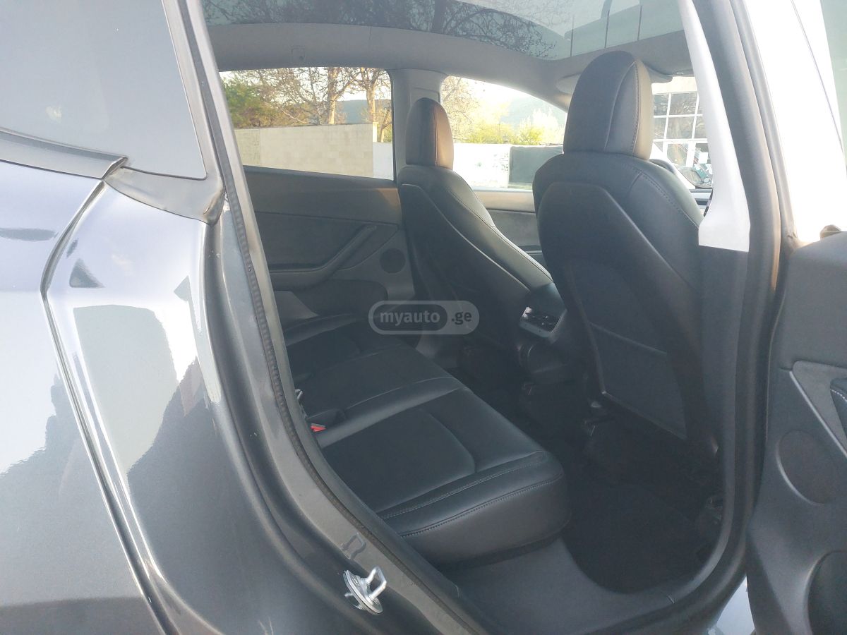 Tesla Model Y - фото 10