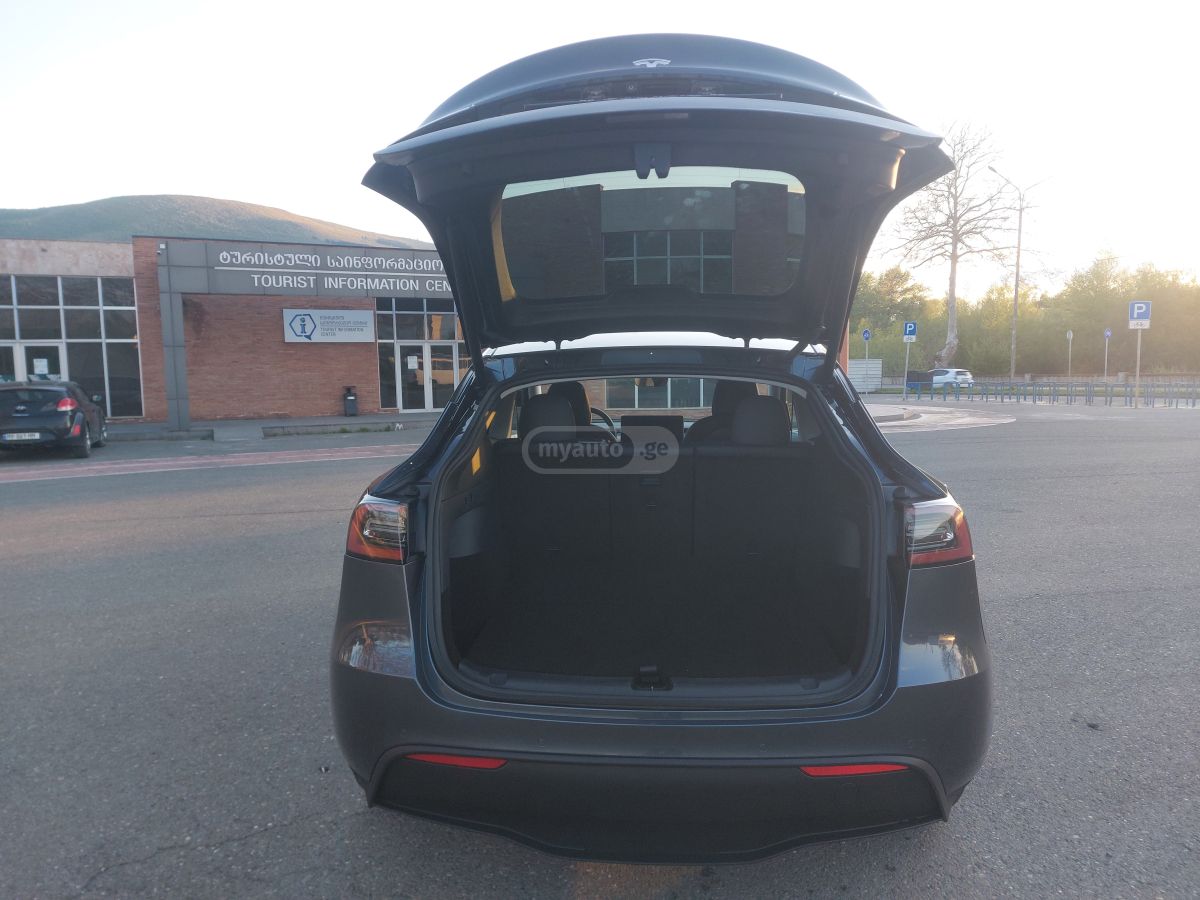 Tesla Model Y - фото 11