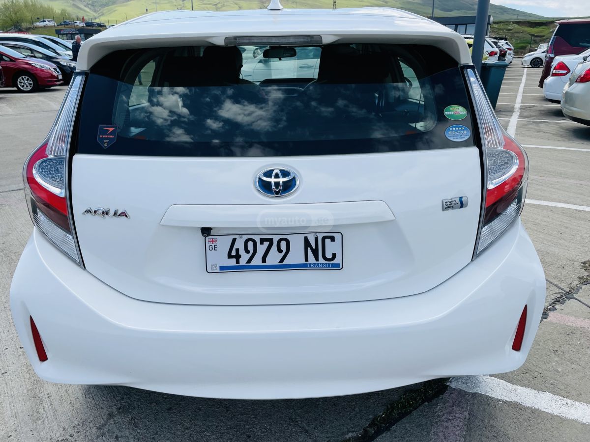 Toyota Aqua - фото 11
