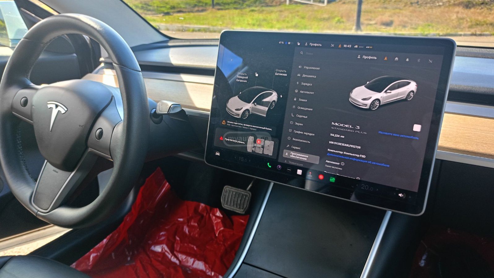 Tesla Model 3 - фото 9