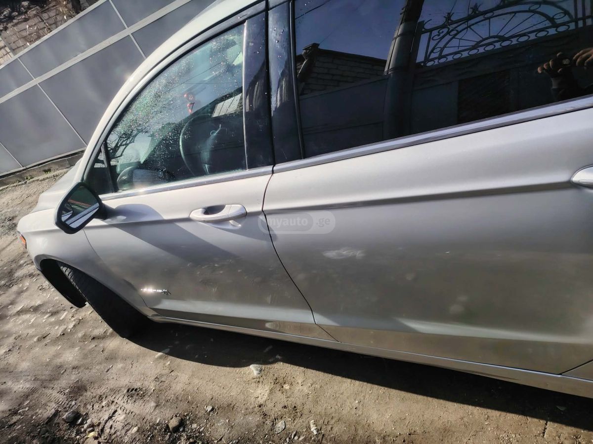 Ford Fusion - фото 7