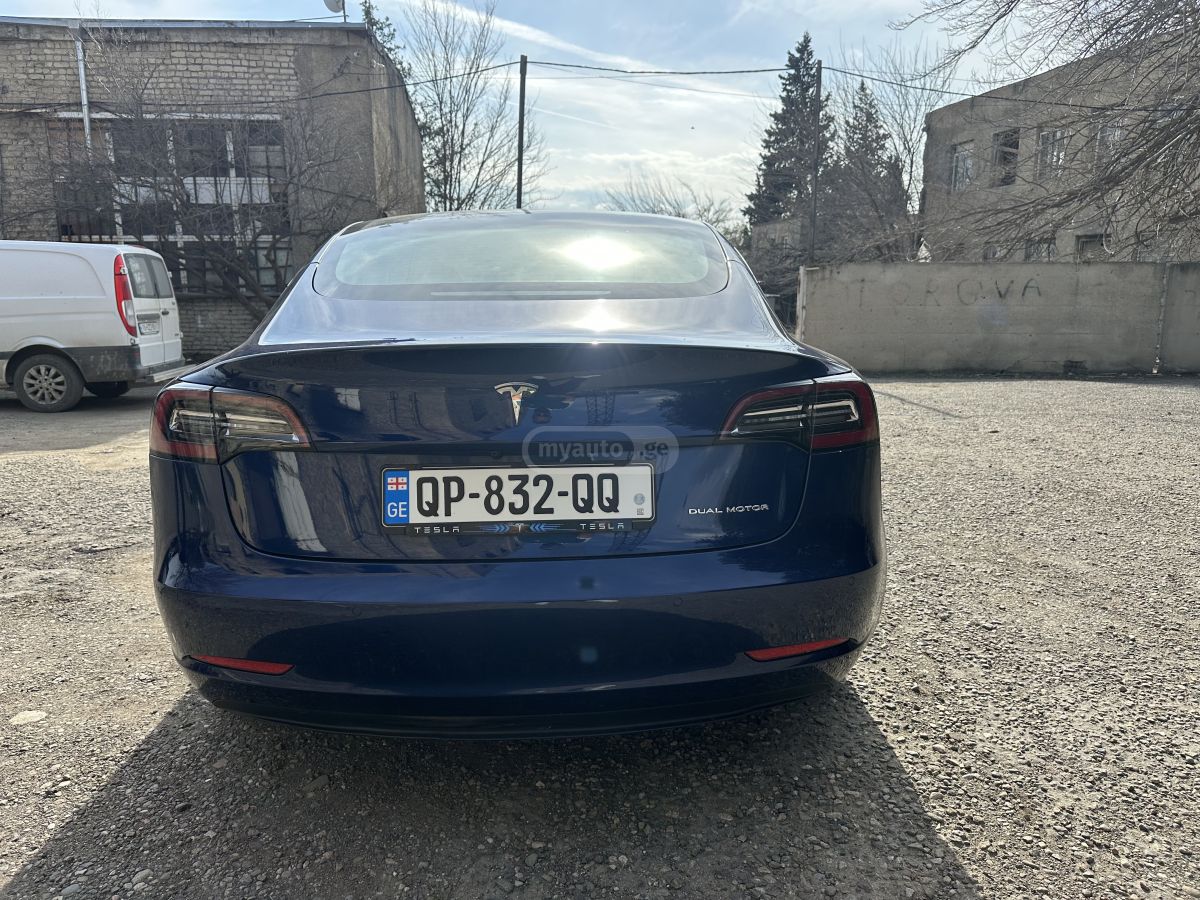 Tesla Model 3 - фото 8