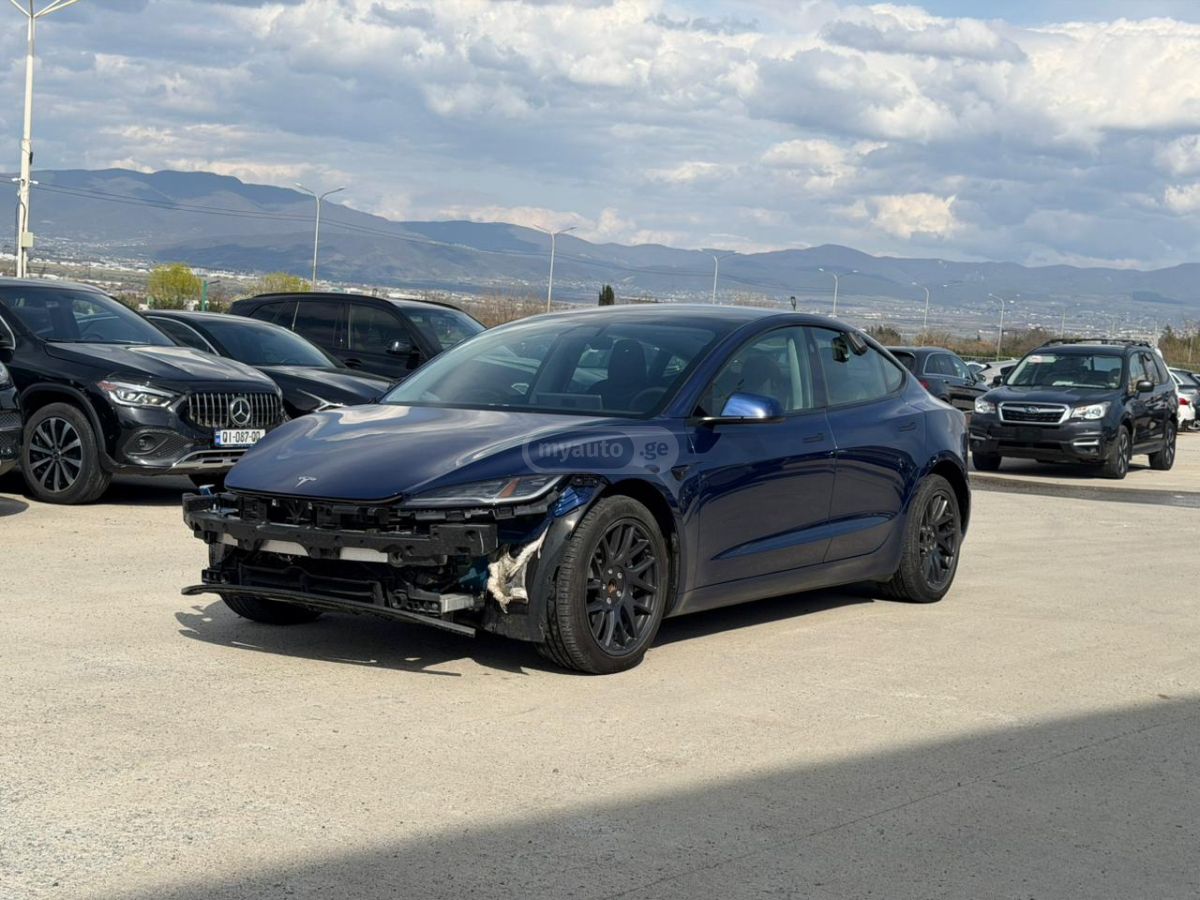 Tesla Model 3 - фото 1