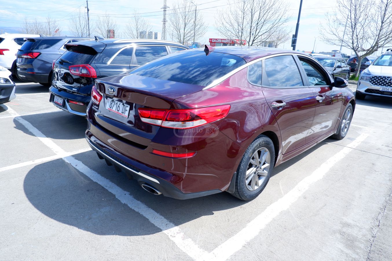 Kia Optima - фото 5