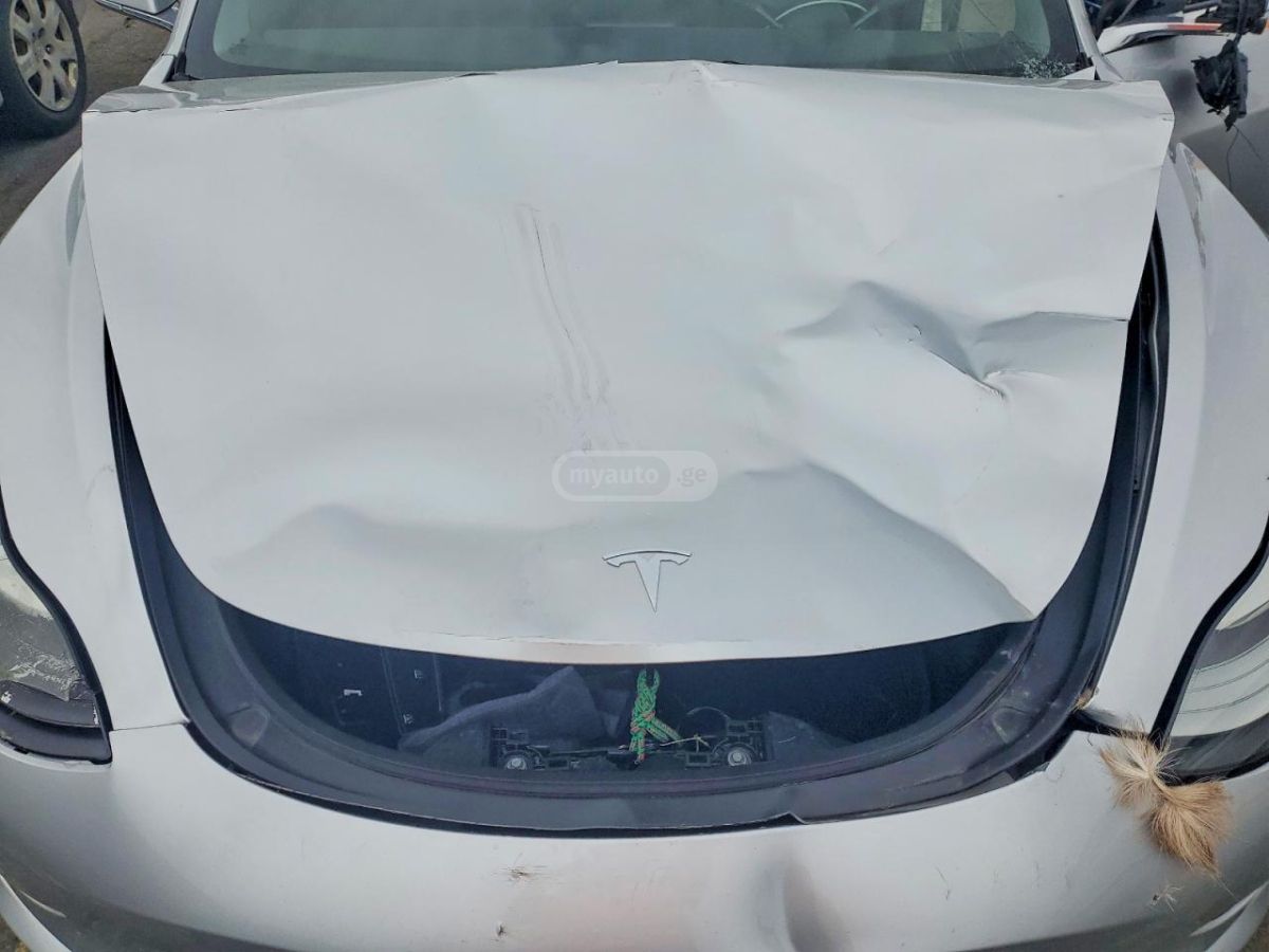 Tesla Model 3 - фото 10