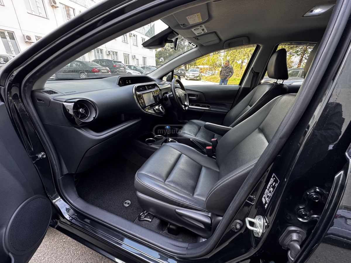 Toyota Aqua - фото 8