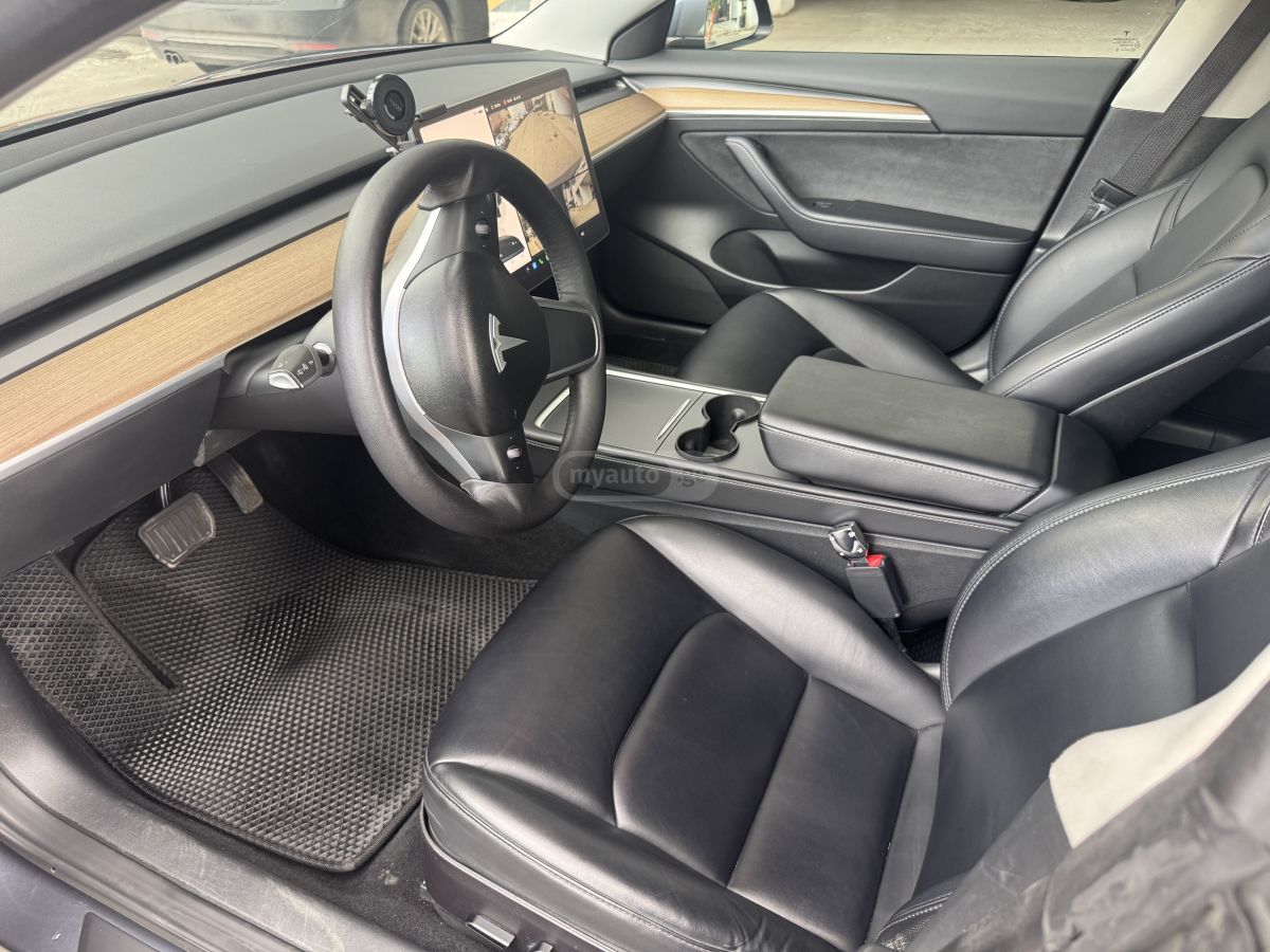 Tesla Model 3 - фото 10