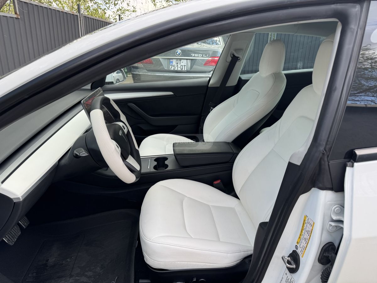 Tesla Model 3 - фото 6