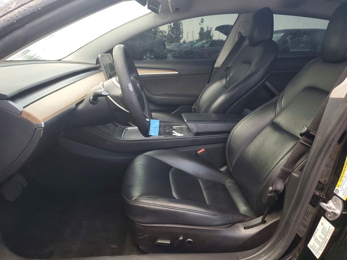 Tesla Model 3 - фото 7