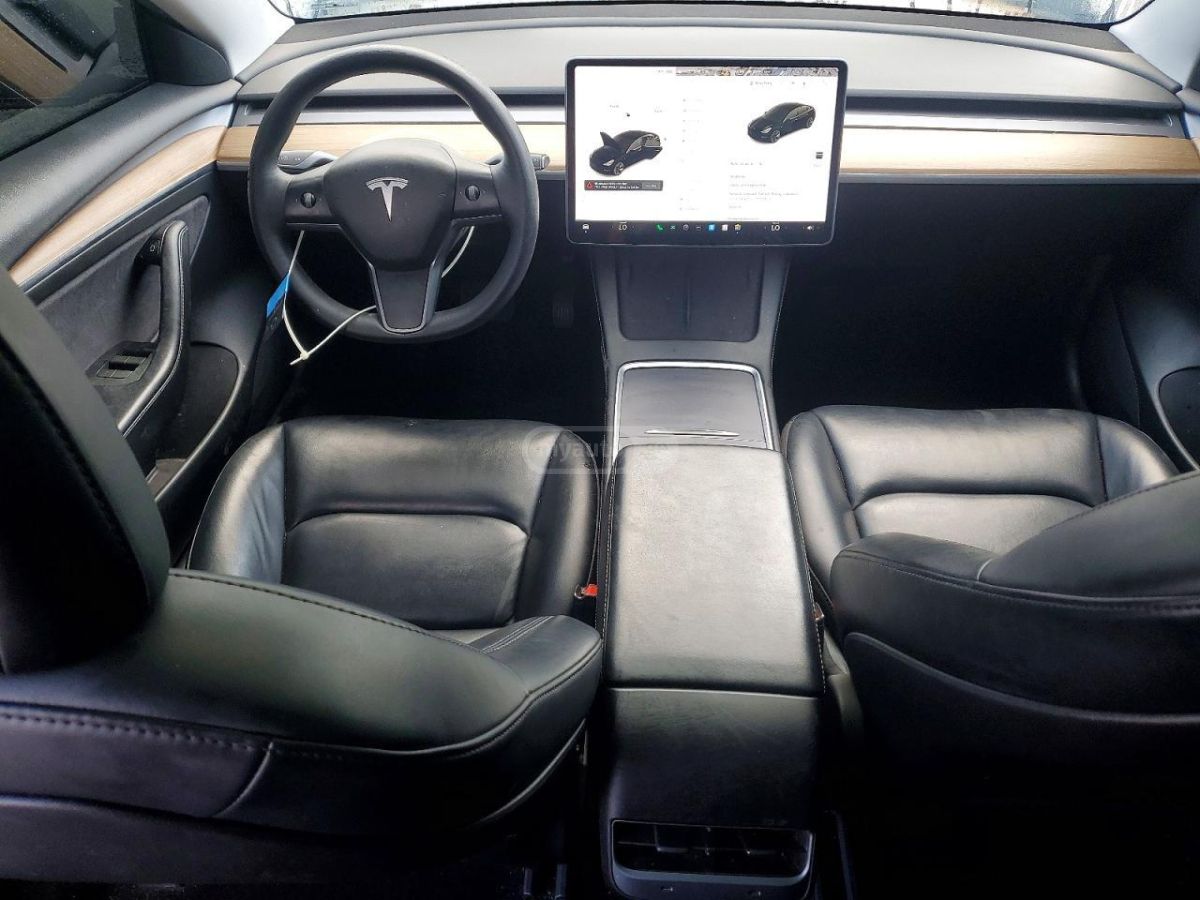 Tesla Model 3 - фото 8